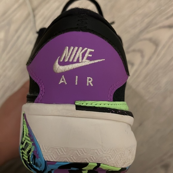 Black and Green Nike Sneakers with Mesh Upper and Colorful Sole